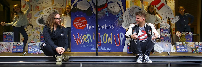 Tim & Steve sitting in the window of Waterstones Piccadilly at the London launch. Photo by Geoff Caddick/PA Wire